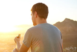 Man eating a protein bar