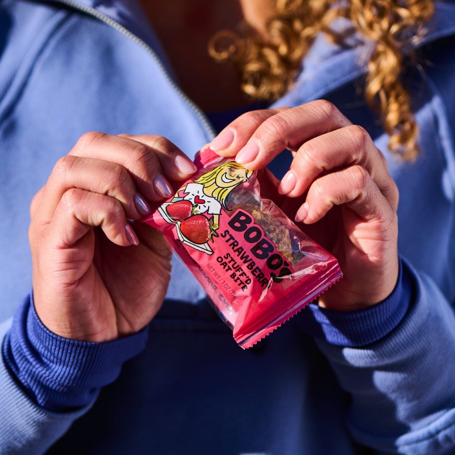 Person holding Bobo's oat bite
