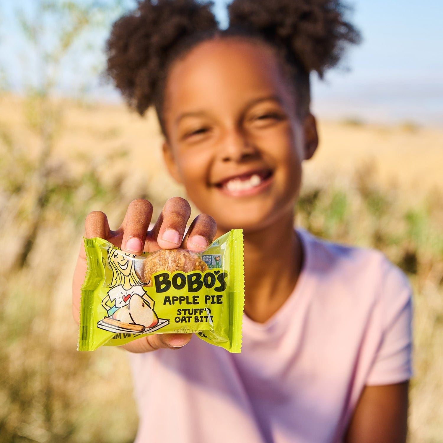 Child holding Bobo's Apple Pie Oat Bite